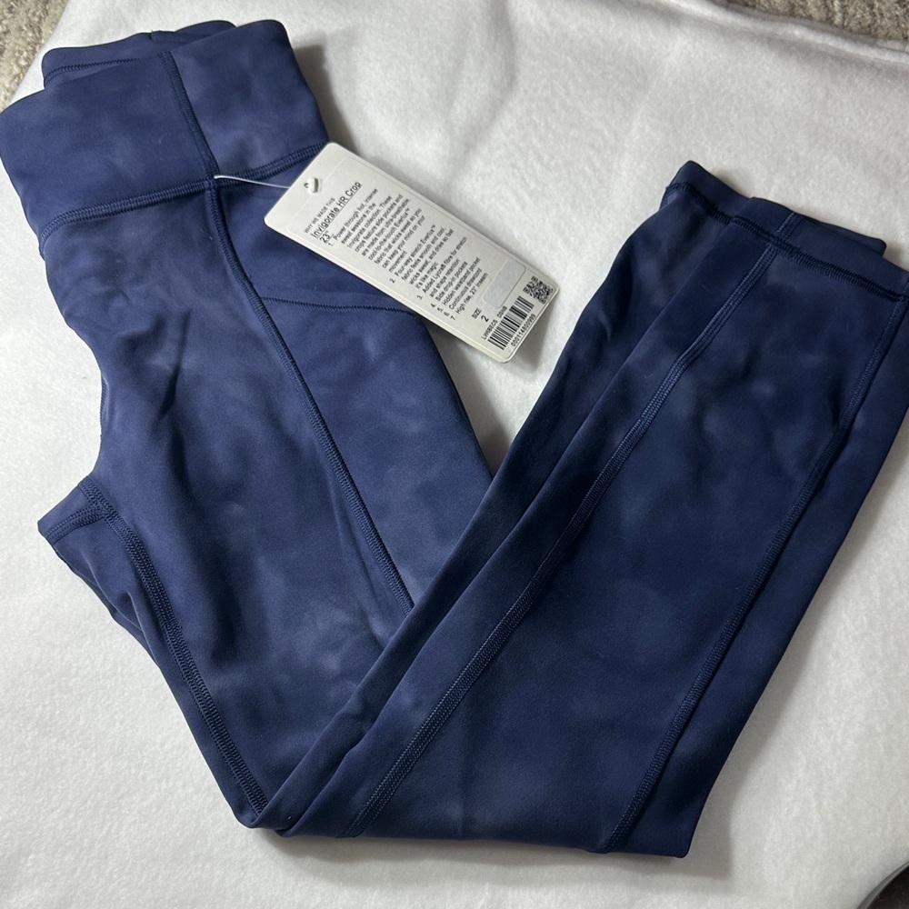 Lululemon Invigorate HR crop Leggings 23”
Size 2 NWT